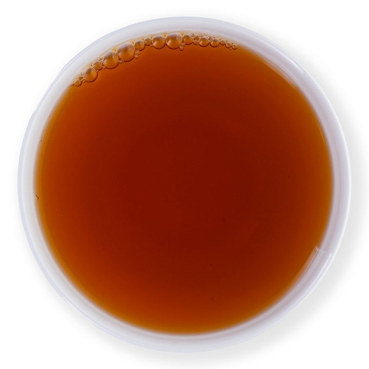 Črni čaj Dooars Putharjhora BIO v skodelici
