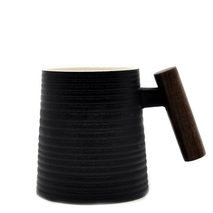 Skodelica iz porcelana Negra z lesenim ročajem 320ml